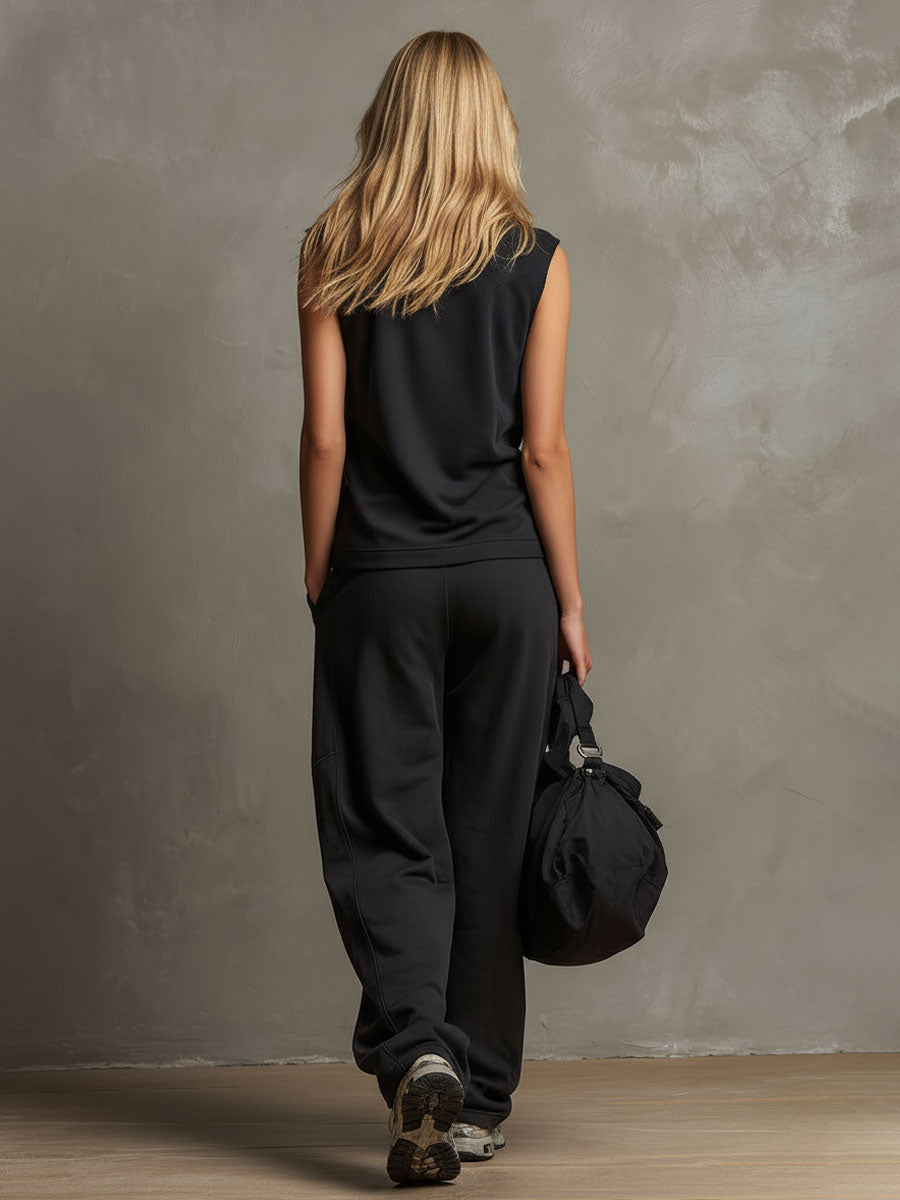 Set aus schwarzem, kragenlosem, knöpfbarem, ärmellosem Oberteil und Hose