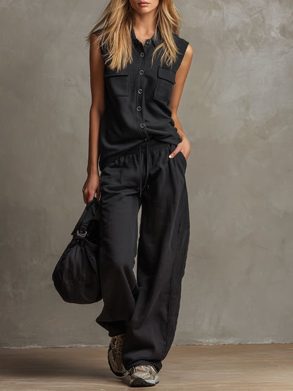 Set aus schwarzem, kragenlosem, knöpfbarem, ärmellosem Oberteil und Hose