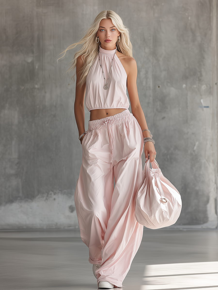 Elegantes und stilvolles Set aus einem ärmellosen Oberteil mit Rundhalsausschnitt und A-Linien-Schnitt sowie einer Hose