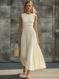 Elegantes, lässiges und bequemes cremefarbenes Maxikleid aus gestricktem Chiffon mit plissiertem Saum